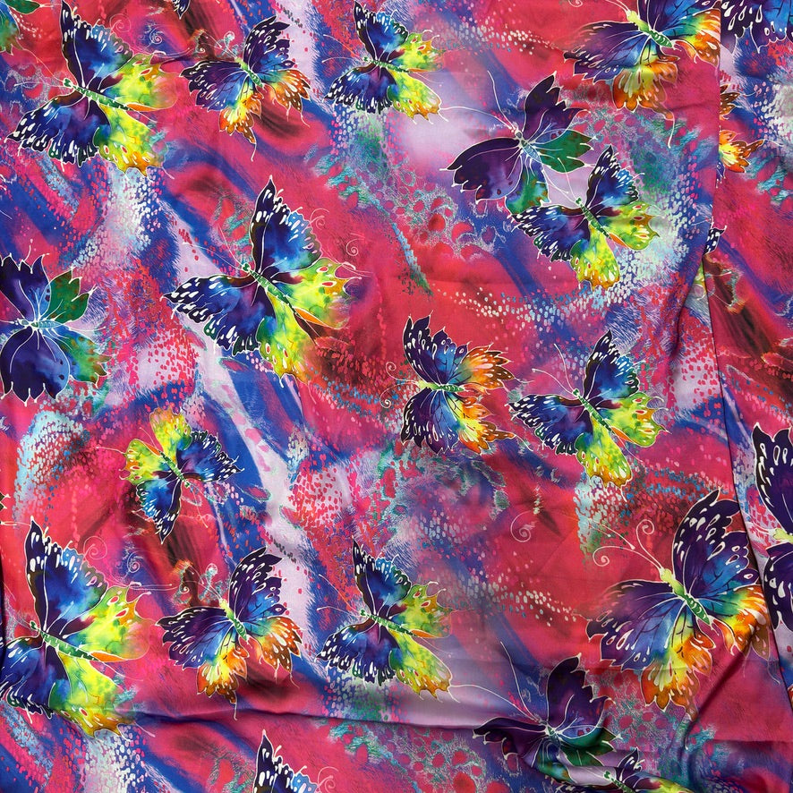 Pink butterfly print silk touch satin fabric with purple, blue, yellow and green butterflies - Bullring Fabrics