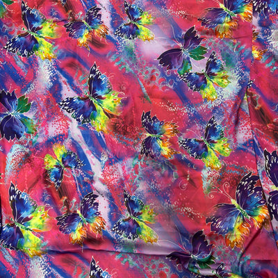 Pink butterfly print silk touch satin fabric with purple, blue, yellow and green butterflies - Bullring Fabrics