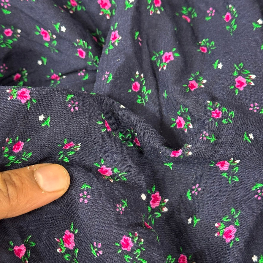 Navy ditsy rosebud floral print viscose fabric with pink roses and green leaves - Bullring Fabrics
