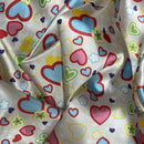 Colorful heart and flower patterned fabric
