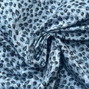 Leopard print fabric with a blueish tint
