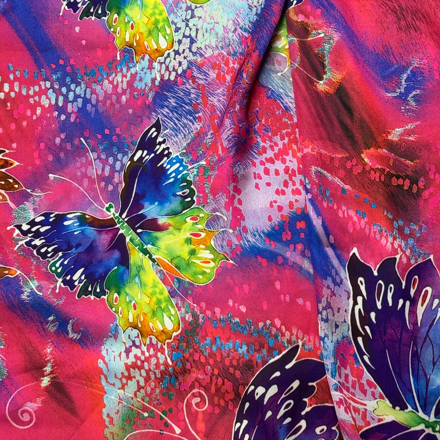 Pink butterfly print silk touch satin fabric with purple, blue, yellow and green butterflies - Bullring Fabrics