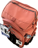 A coral pink or salmon-colored titanium backpack shown on a plain white background, with retail tags attached to the front zipper area.