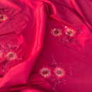 Red taffeta fabric with floral embroidery