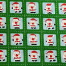 Tissu en polycoton de Noël avec des timbres de Père Noël 