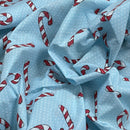 Candy Cane White Pinspots Christmas Polycotton Fabric 45", Sky