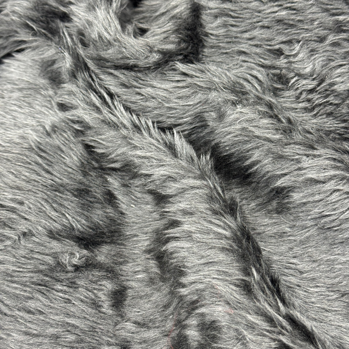Close-up of charcoal faux fur pile with lighter grey tips - image 2