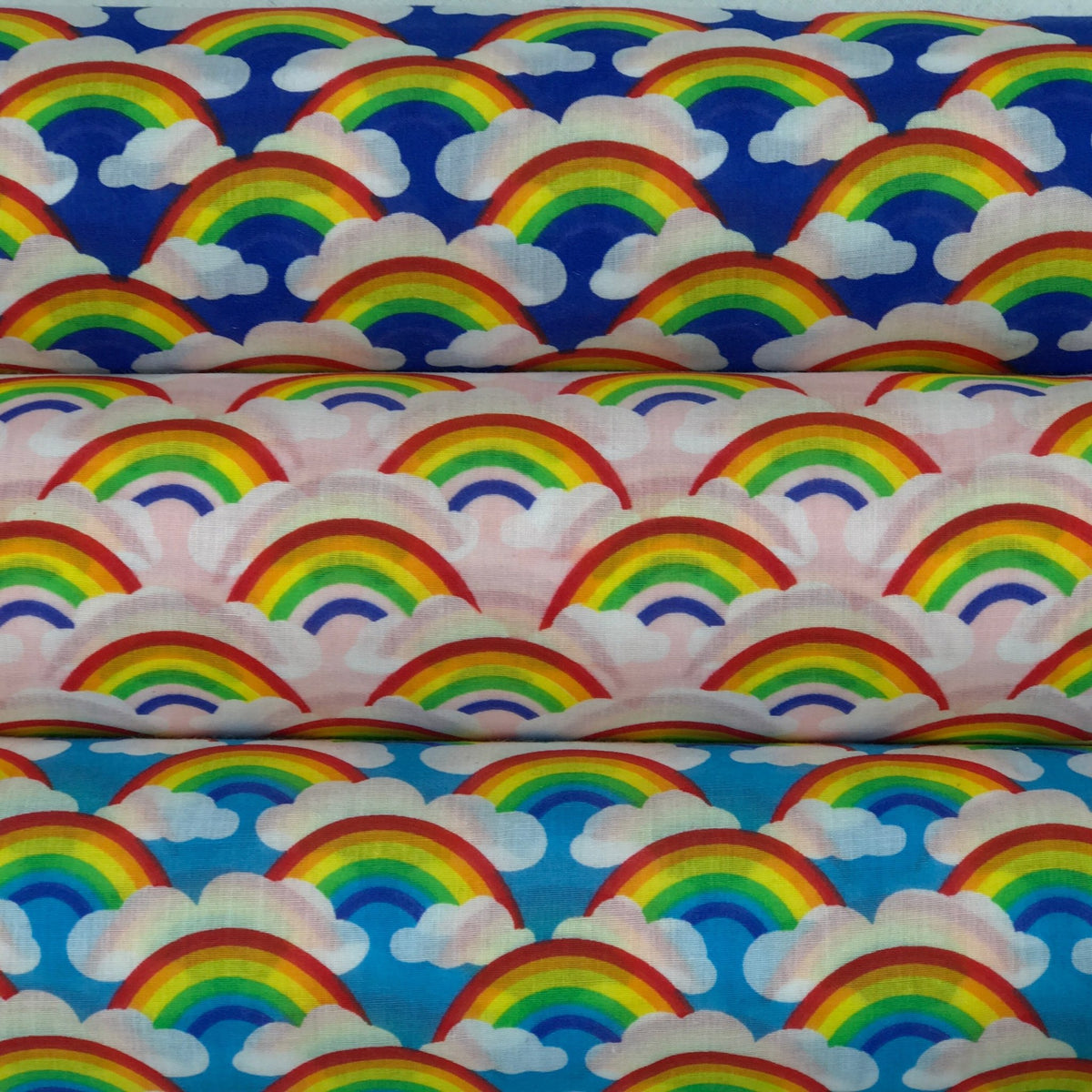 Rainbow In Clouds Polycotton Dress Fabric 45", Royal Blue - Bull Ring Fabrics