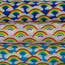 Rainbow In Clouds Polycotton Dress Fabric 45", Royal Blue - Bull Ring Fabrics