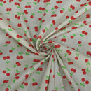 Red Cherries Printed Polycotton Fabric 112cm, Cream - Bull Ring Fabrics