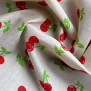 Red Cherries Printed Polycotton Fabric 112cm, Cream - Bull Ring Fabrics