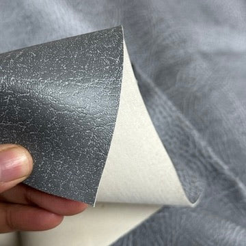 Grey faux leather turned back to show white fabric backing - image 5