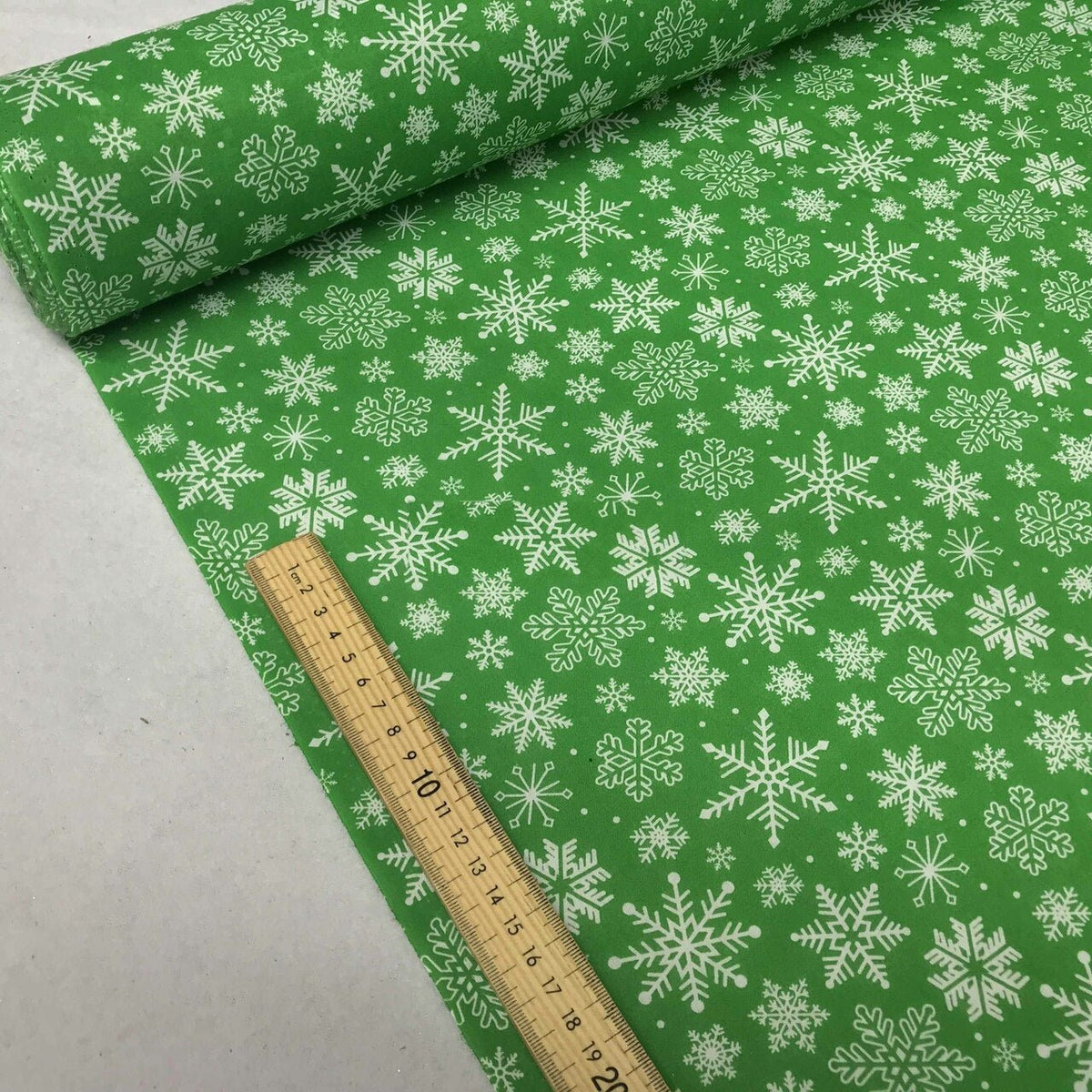 10m White Xmas Snowflakes Christmas Polycotton Fabric 45", Green - Bull Ring Fabrics