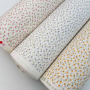Tissu pour robe en popeline de coton avec de minuscules petites fleurs florales